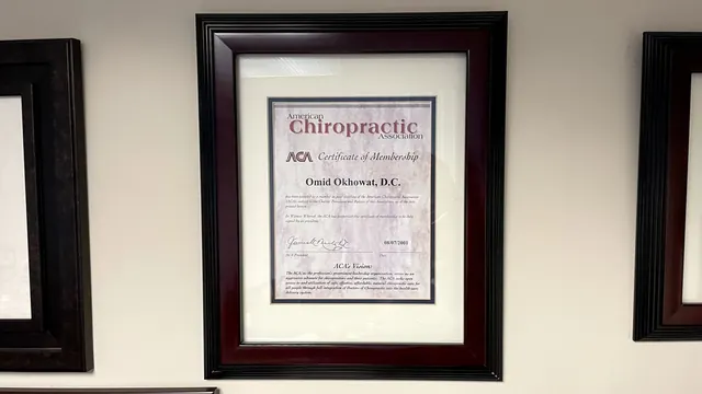 American Chiropractic Association membership certificate on the office wall