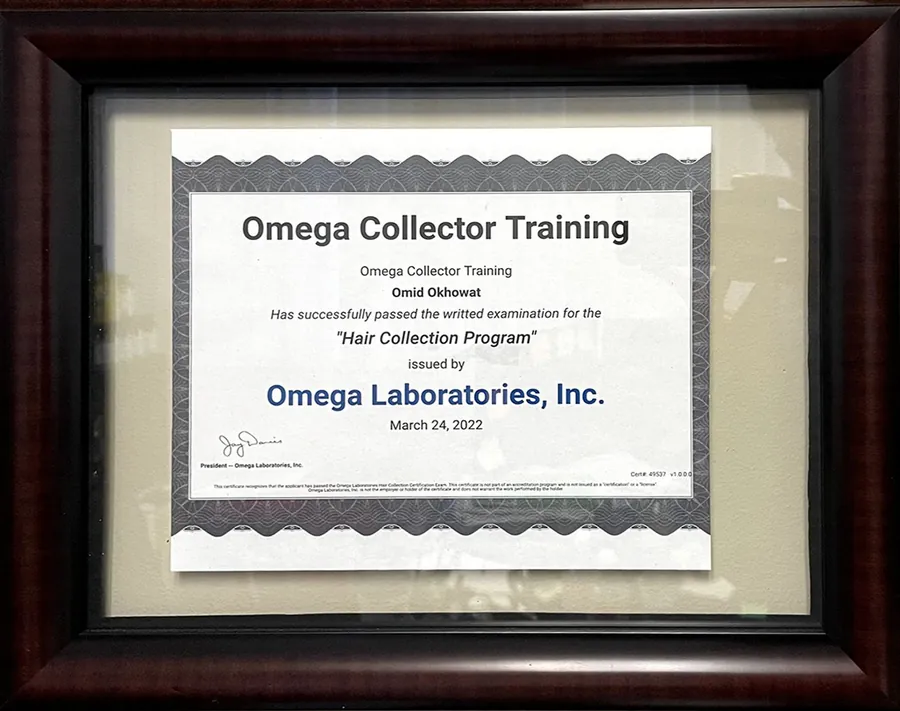 Framed Omega Collector Training certificate for the Hair Collection Program, issued by Omega Laboratories, Inc. to Omid Okhowat