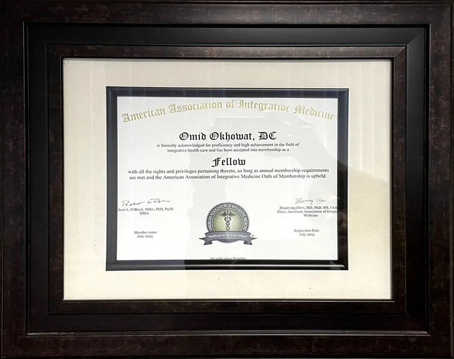 Framed Fellow certificate from the American Association of Integrative Medicine for Omid Okhowat, DC