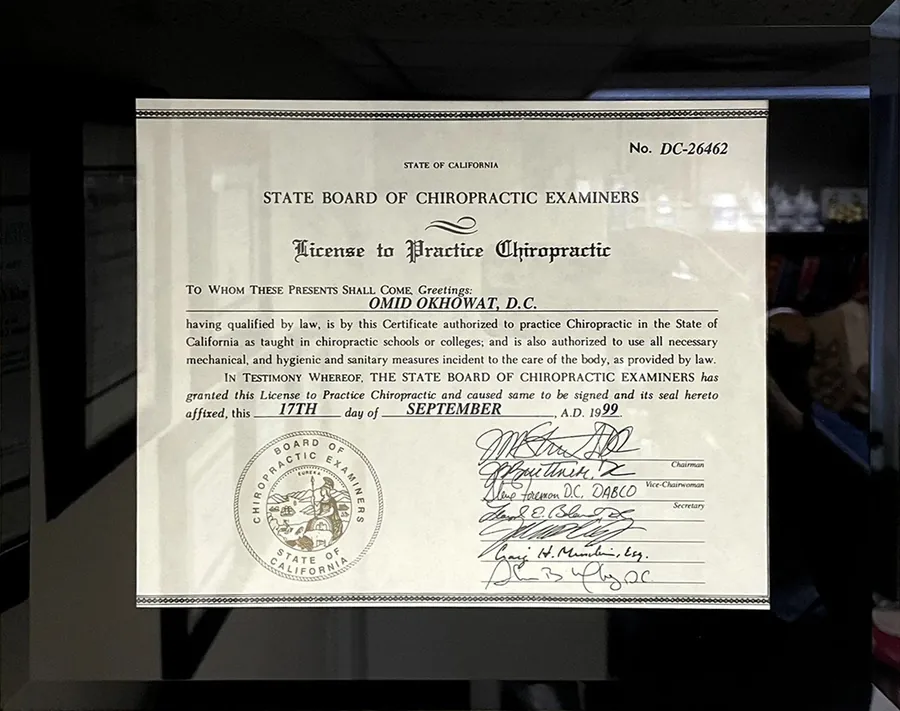 Framed License to Practice Chiropractic issued by the State Board of Chiropractic Examiners to Omid Okhowat, D.C.